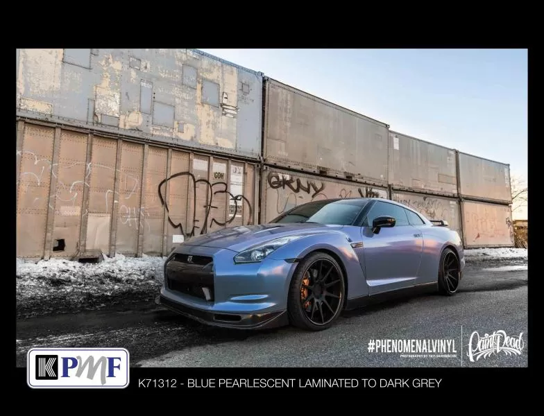 Sports car wrapped with KPMF Blue Pearlescent Laminate vinyl